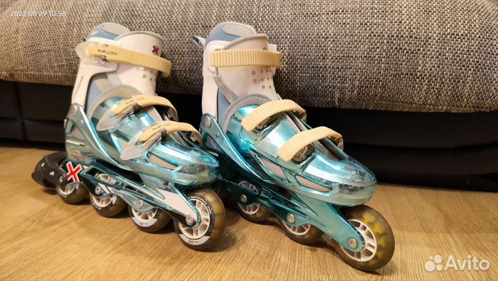 Роликовые коньки