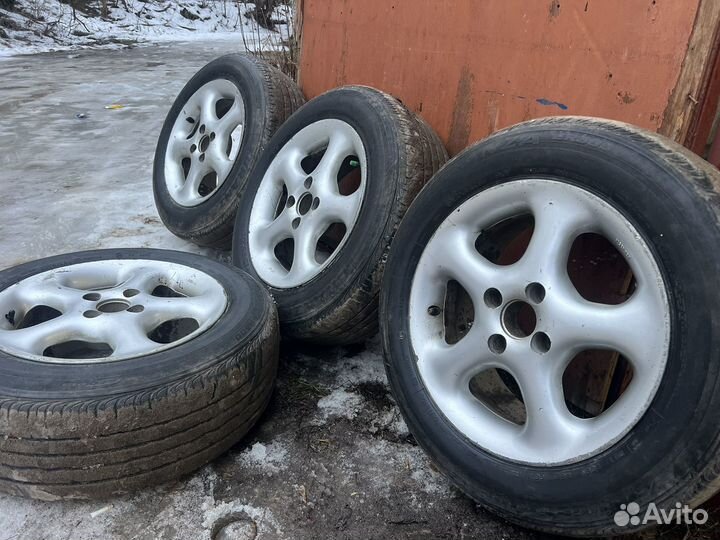 Диски мазда 323