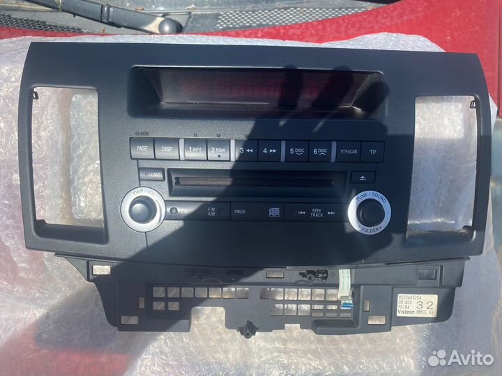 Штатная магнитола и панель на Mitcubichi Lancer 10