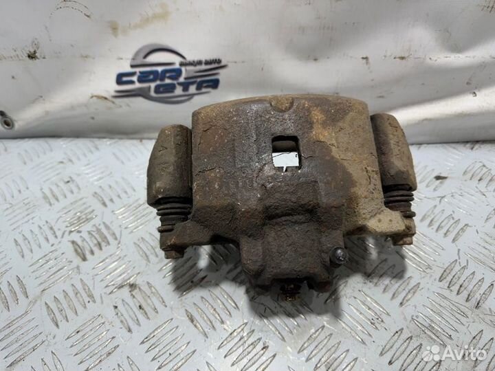 Суппорт тормозной Mitsubishi Lancer 9 4G18