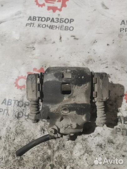 Суппорт тормозной передний левый Nissan Sunny