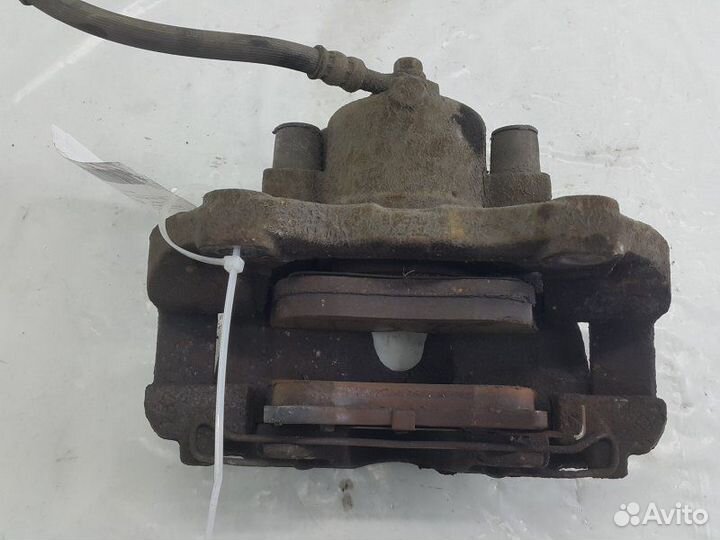 Суппорт тормозной передний левый Opel Astra