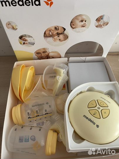 Молокоотсос medela swing maxi & calma