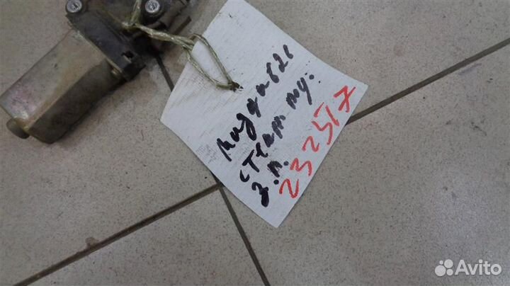 Моторчик стеклоподъемника задний левый Mazda 626