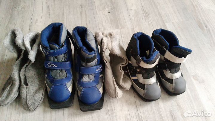 Лыжные ботинки и лыжи