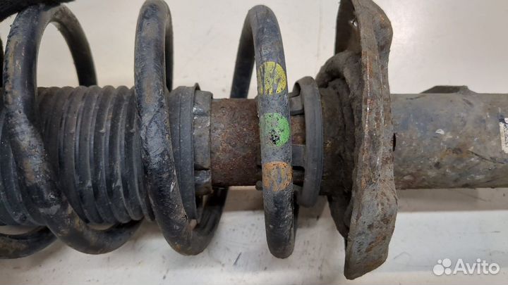 Амортизатор подвески левый передний Volkswagen Tiguan