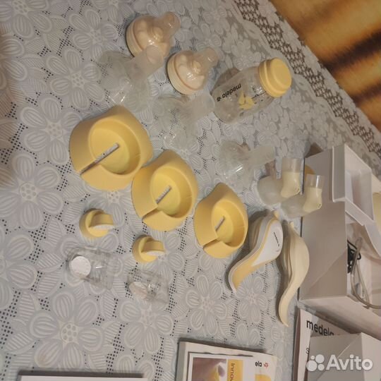 Молокоотсос medela swing электрический