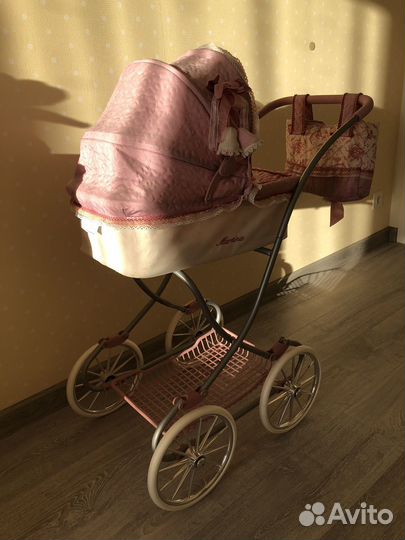 Игрушечная коляска для кукол