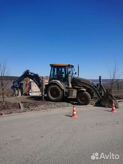 Услуги экскаватора-погрузчика