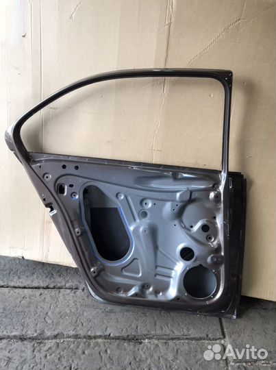 Дверь задняя левая Skoda Rapid