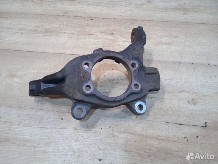 Кулак поворотный передний левый Nissan Teana J32