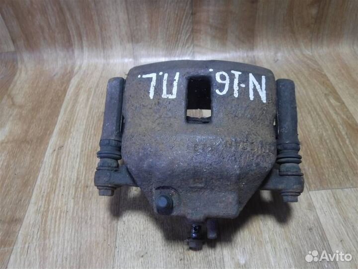 Суппорт передний левый Nissan Almera N16 2000-2006