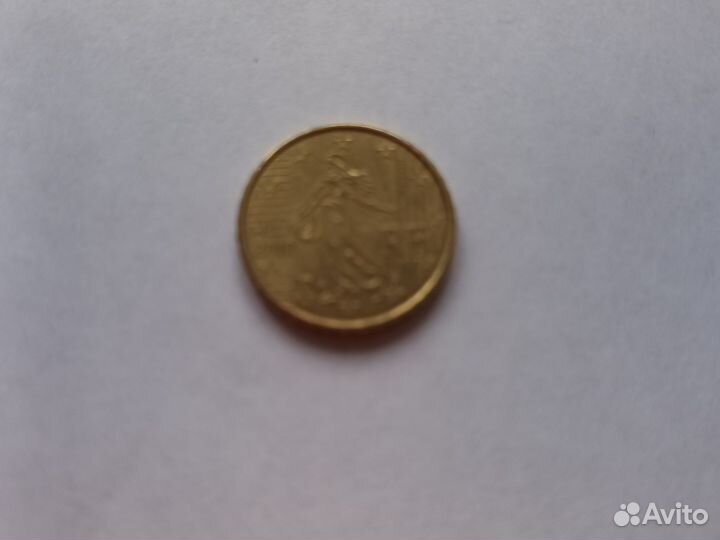 Монеты 20 центос и 10 центов евро