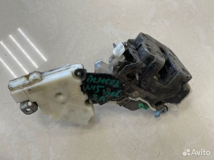 Замок боковой двери задний левый Nissan Almera N15