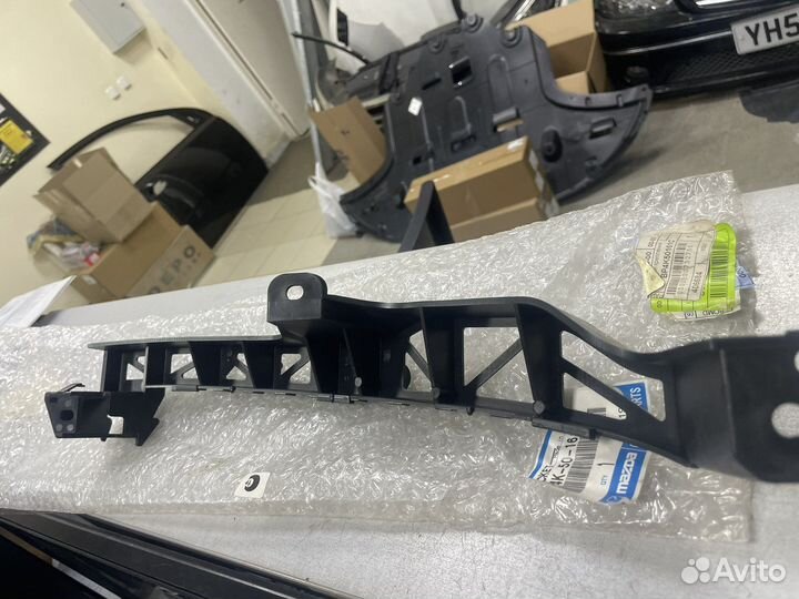 Кронштейн фары левый mazda 3 bk BP4K50161C