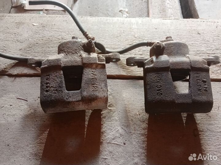 Суппорт передний Лачетти