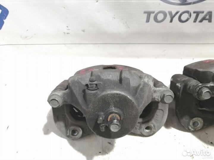 Суппорт тормозной передний Kia Sportage 2 KM