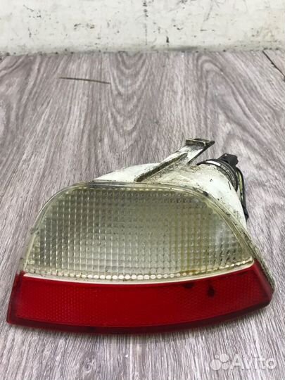 Фонарь противотуманный задний левый Ford Focus 1