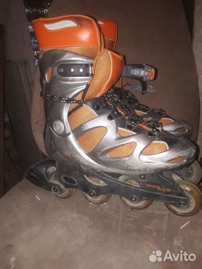 Роликовые коньки