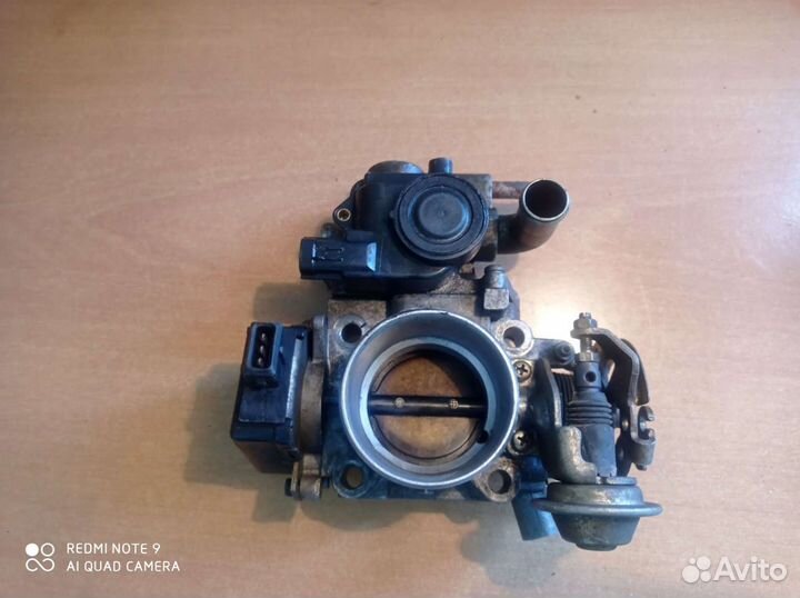 Заслонка дроссельная механическая Mazda 323