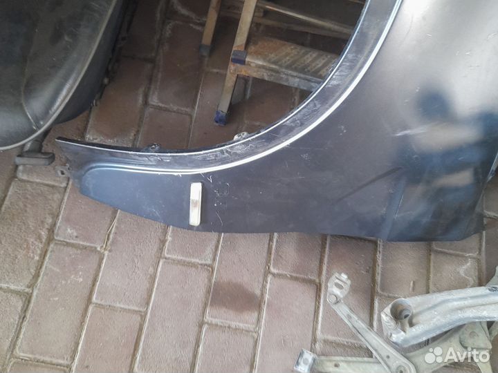 Крыло левые bmw е 53