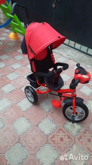 Трехколесный велосипед с ручкой