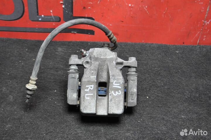 Суппорт задний левый toyota RAV4 ACA33