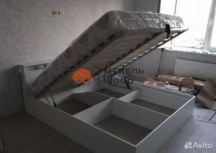 Кровать с подъемным механизмом