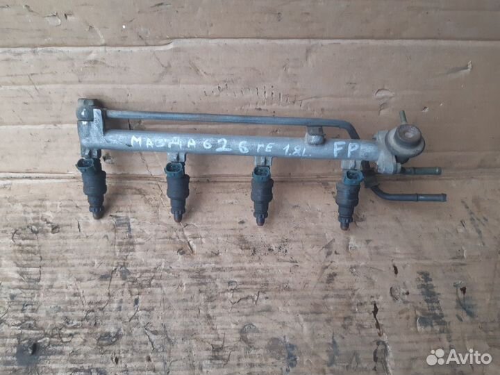Форсунка топливная Мазда 626 ге