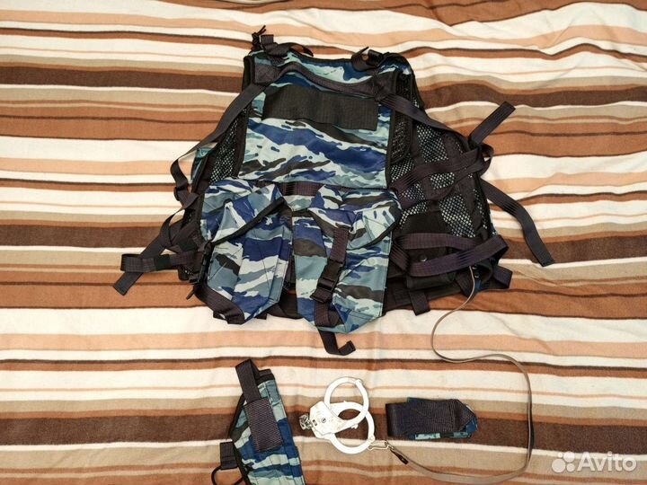 Жилет разгрузочный камуфлированной серой расцветки