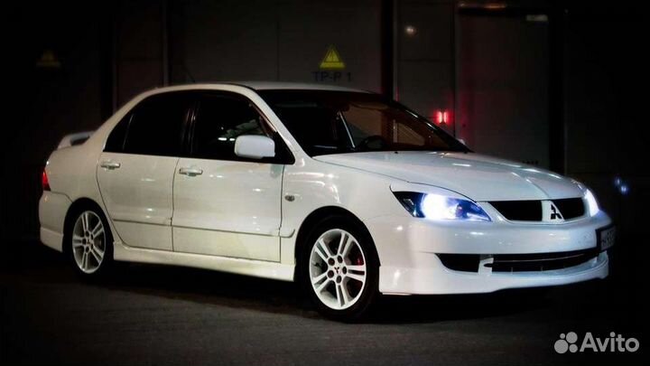 Вакуумный усилитель тормозов Митсубиси Лансер 9