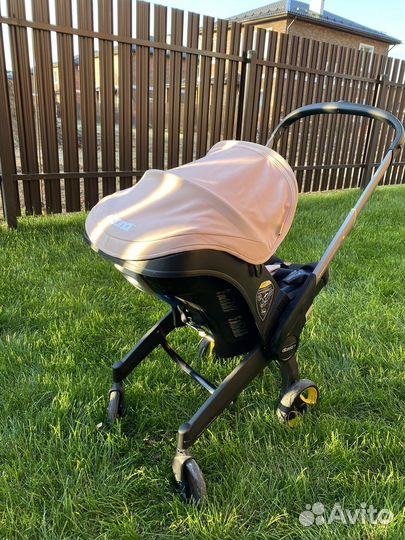 Коляска автокресло doona с базой isofix