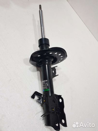 Амортизатор передний левый Nissan