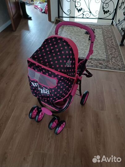 Детская игрушечная коляска