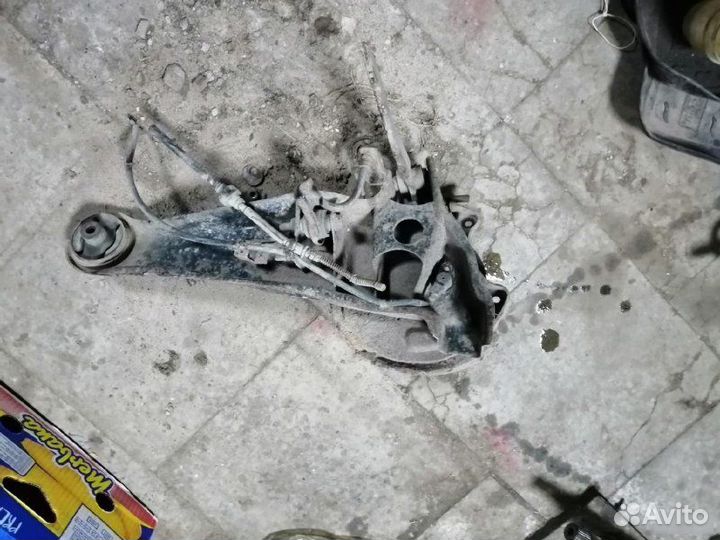 Кулак задний правый Mitsubishi Lancer 9