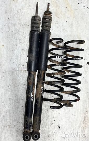 Задний амортизатор стойка Renault Logan логан