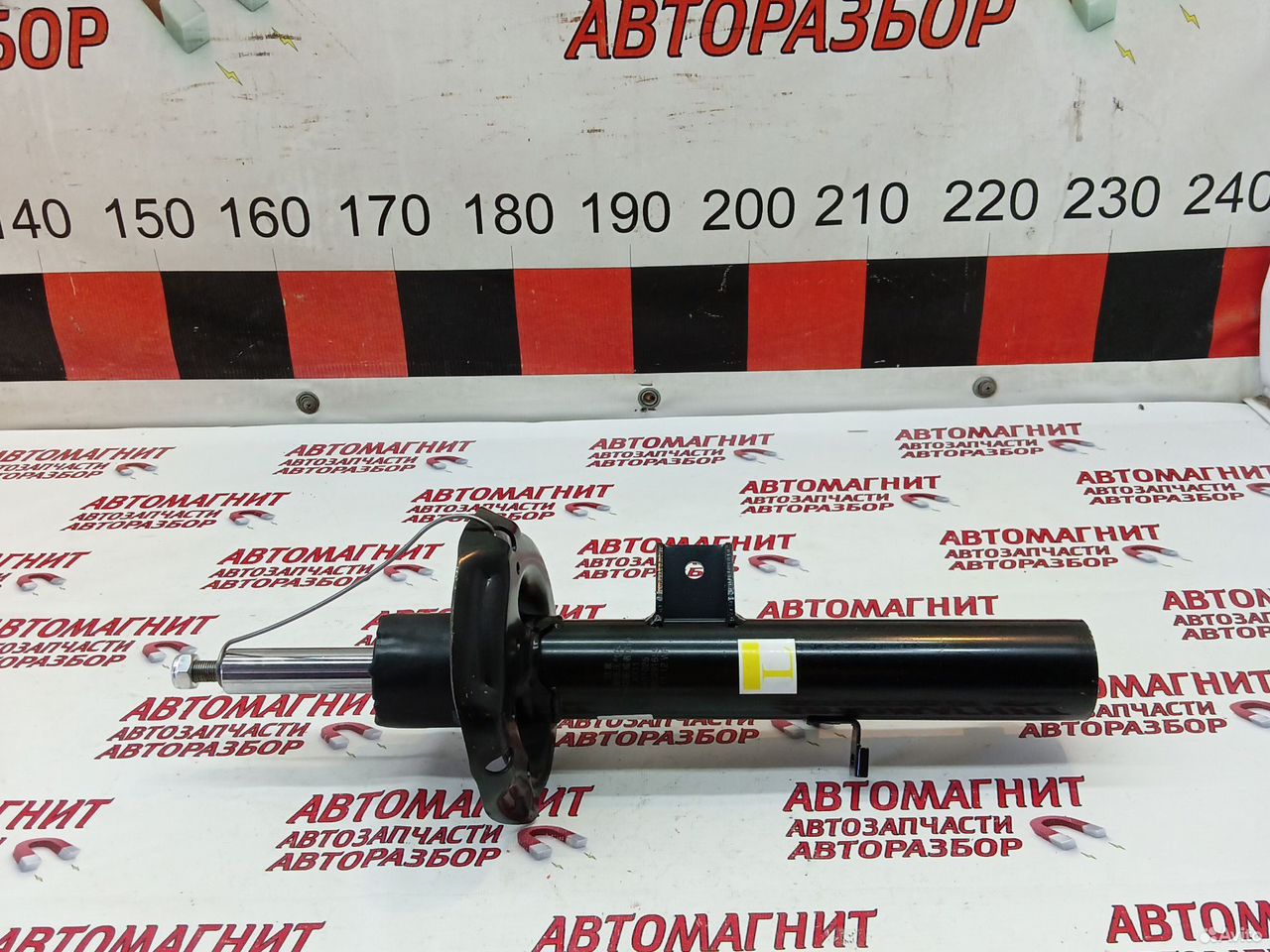 Амортизатор стойка передняя левая Джили Монжаро