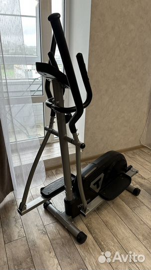 Эллиптический тренажер torneo