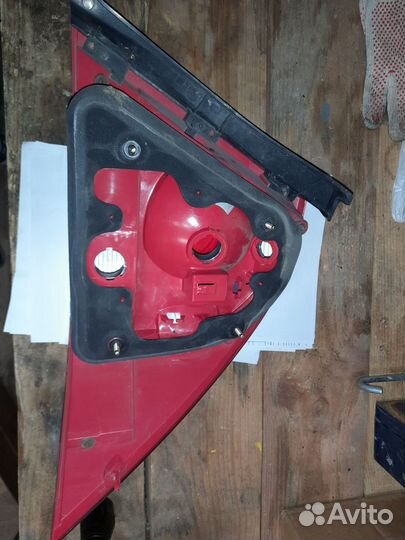 Фонарь задний левый Nissan Almera classic