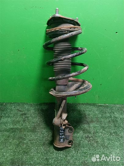 Стойка амортизатора передняя правая KIA ceed (ED)