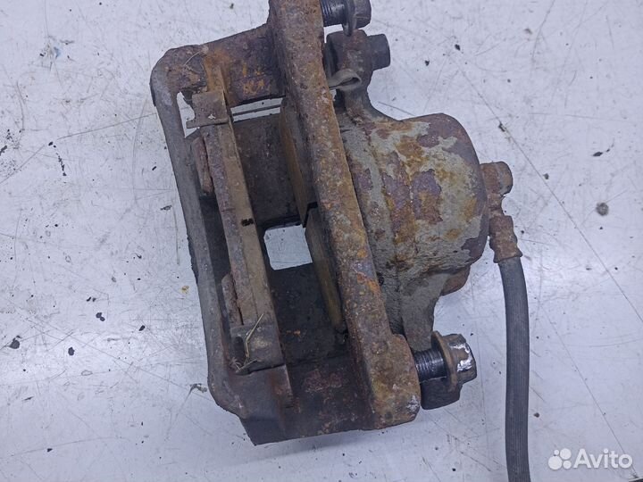 Суппорт тормозной передний п mitsubishi galant 8