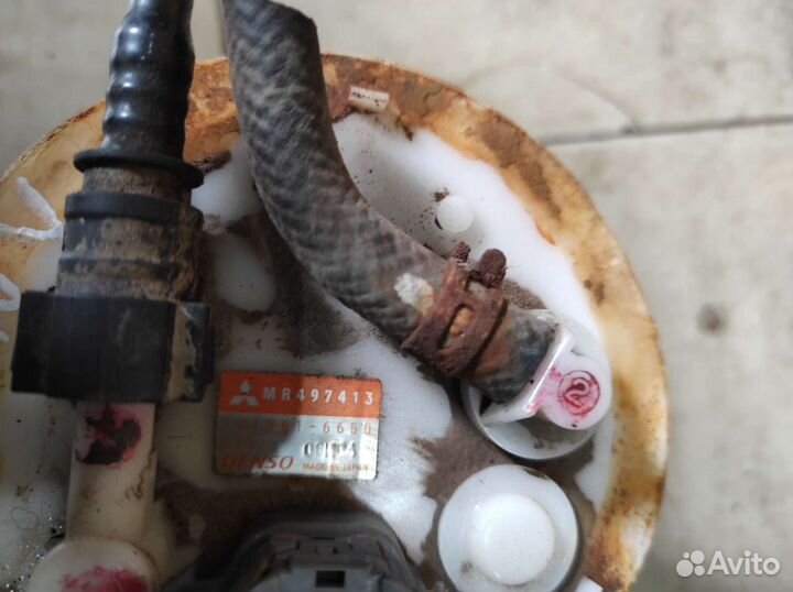 Насос топливный MR497413 Mitsubishi Lancer 9 CS1A