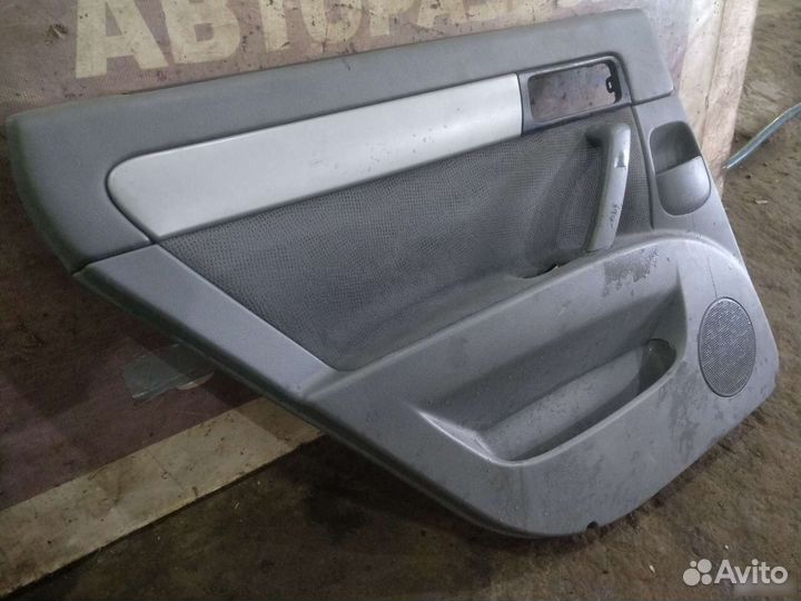 Дверная карта обшивка задняя левая Chevrolet Lacet