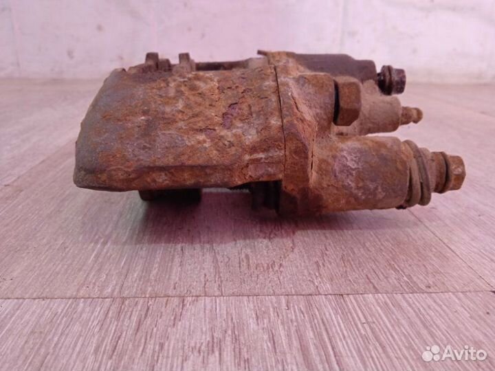 Суппорт передний левый Kia Rio DC A5D 2002