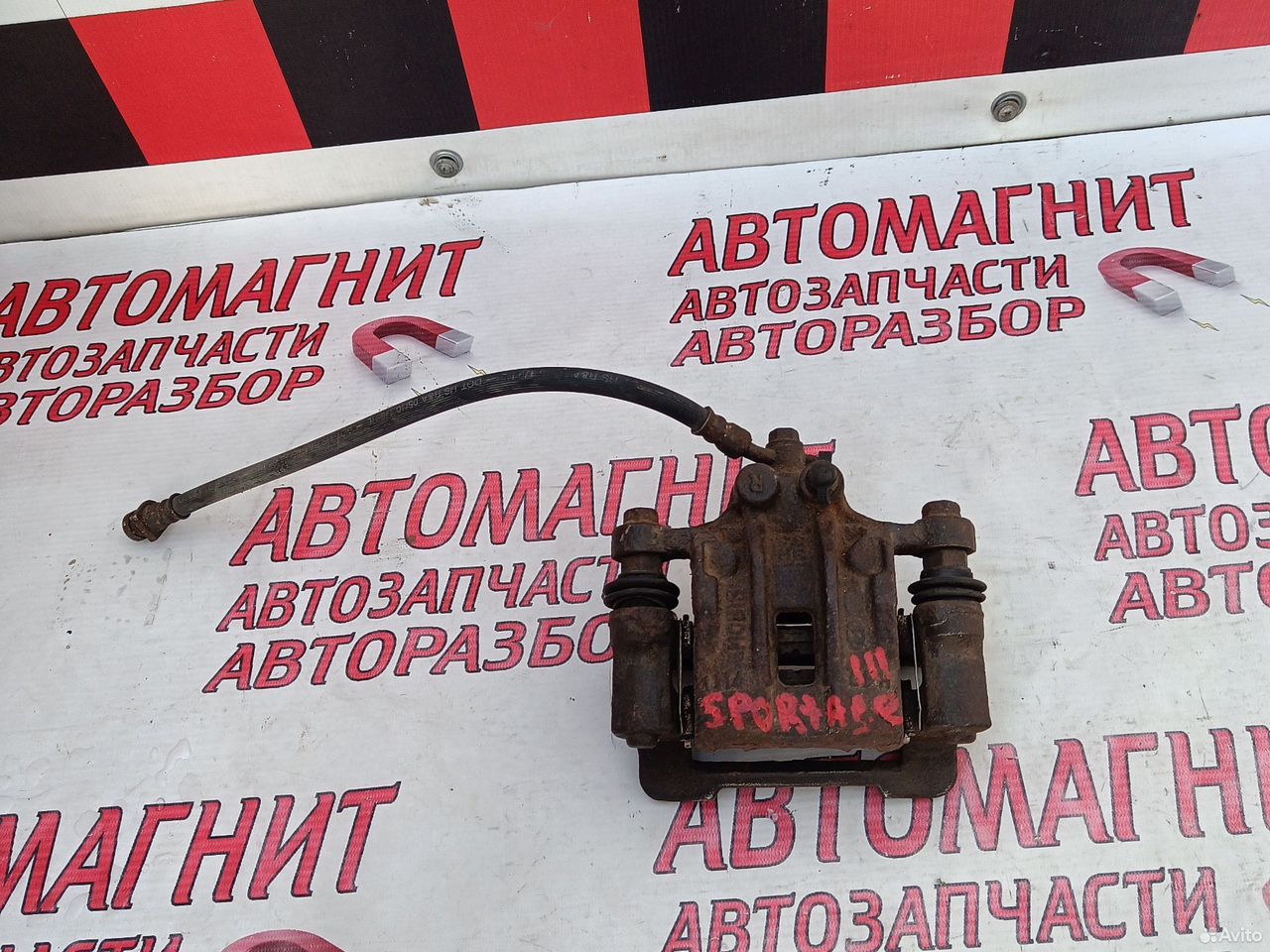 Супорт тормозной задний правый Киа Спортейдж 3