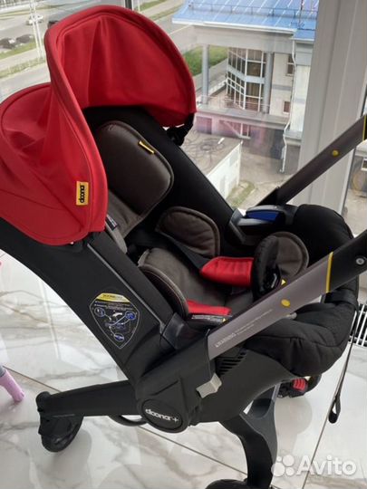 Автолюлька doona