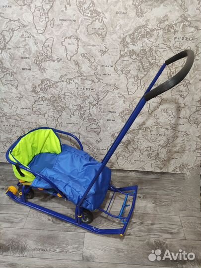 Детские санки с колесами и чехлом
