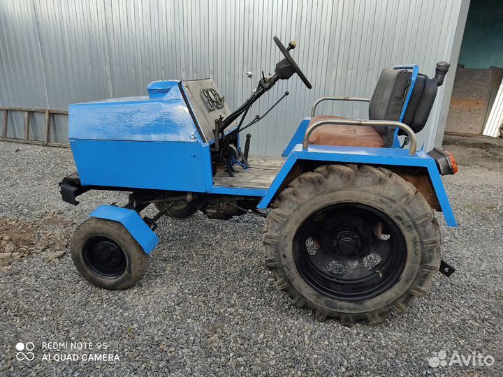 Мини-трактор, 2002