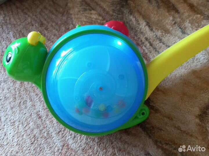 Игровая дуга с игрушками. Каталка музыкальная