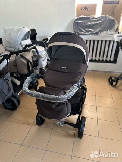 Tutis Nanni коричневая и черная Коляска с рождения